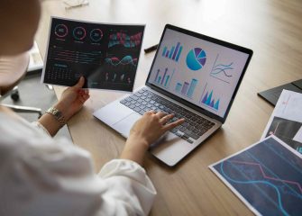 office-workers-using-finance-graphs-min